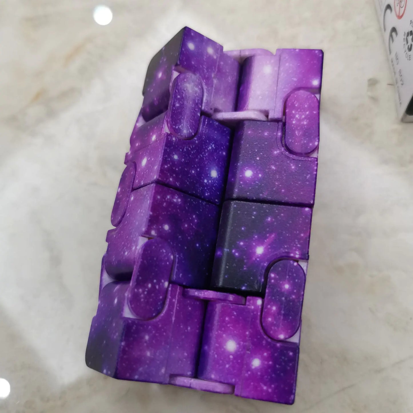 Starry Sky Fidget Cube - Mesmerizing motion: Fold, flip, and loop endlessly for ultra-satisfying fidget flow